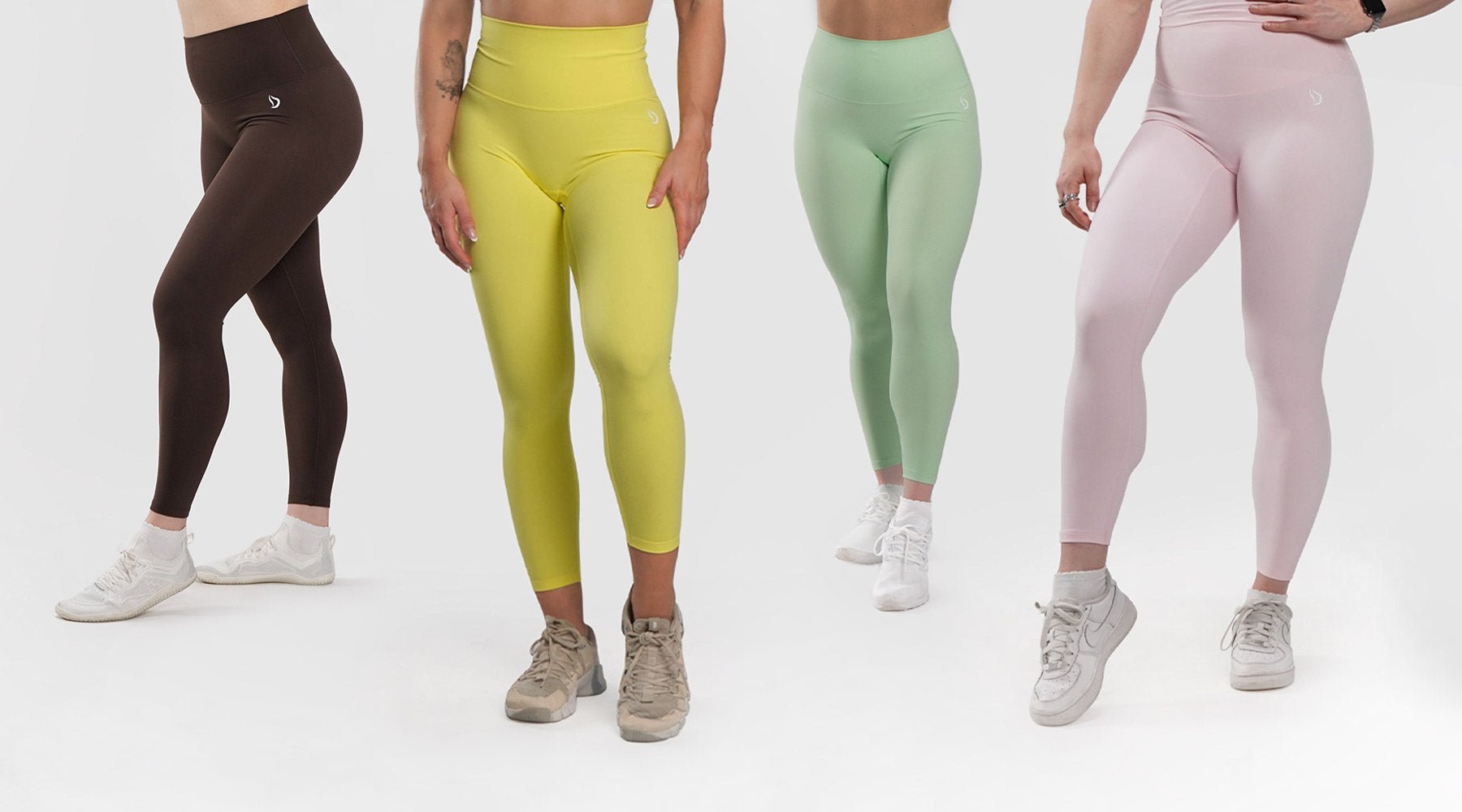 Side‑by‑side view of Core and Confidence leggings on two women, showing waistband and overall fit in a gym setting