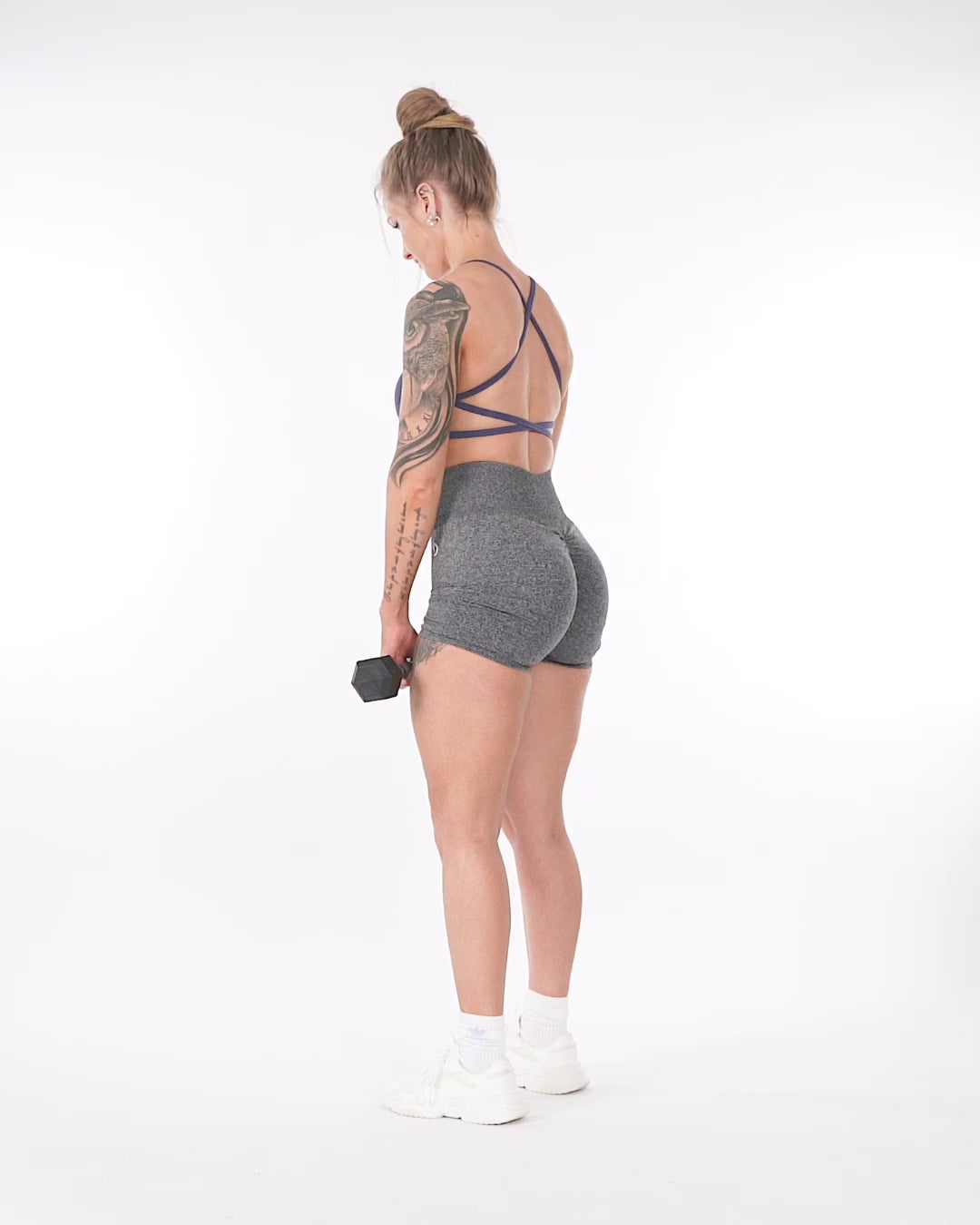 A model wears Wimble-Bum shorts created by Direct Line to fix the